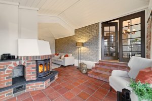 Rustikk og romslig peisestue på 22 m² 