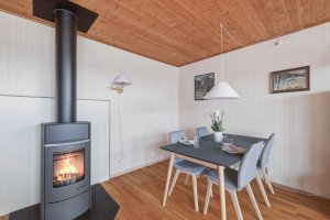 Pen og effektiv vedovn gir både varme og ekstra hygge.